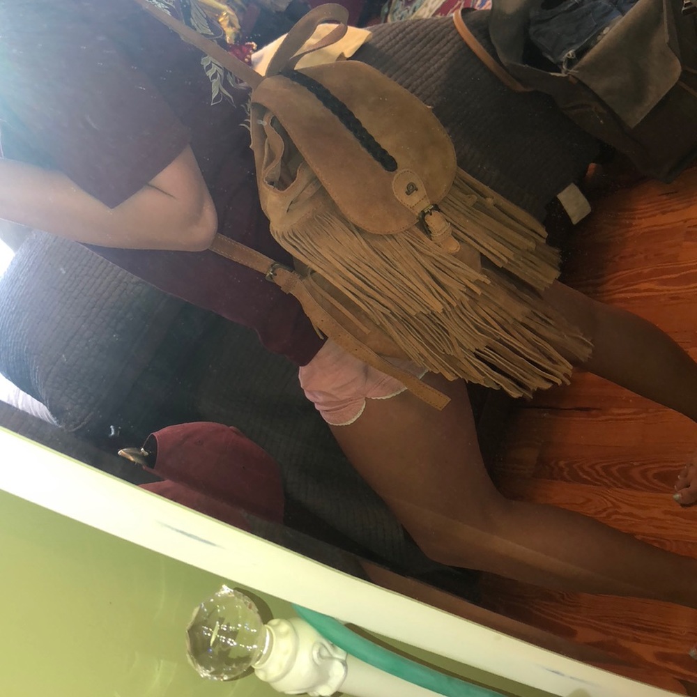 Suede super cute fringe backpack!